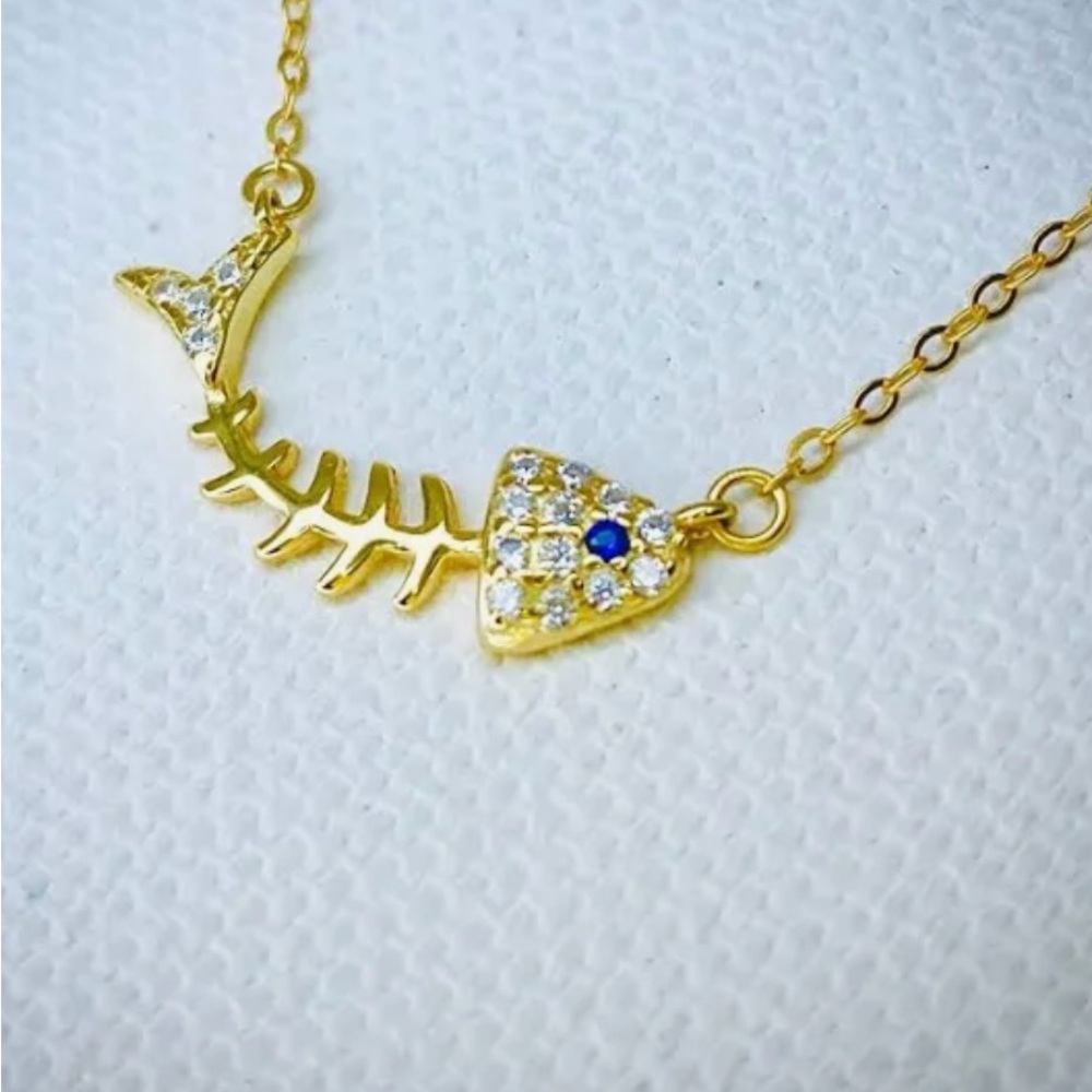 Sterling Silver Fishbone Necklace: Cubic Zirconia Ocean
Charm